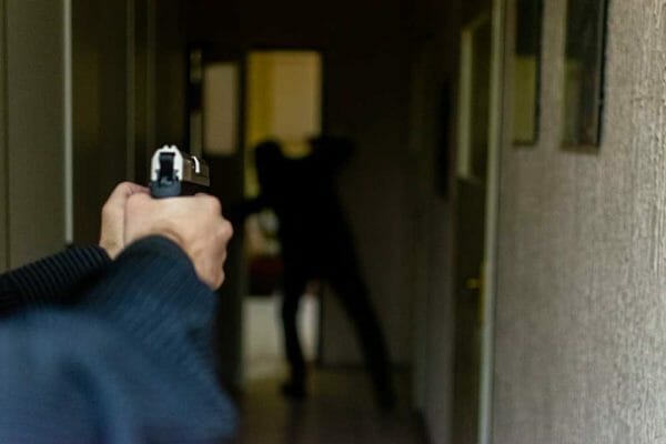 Armed Citizen Shoots Armed Fugitive During Home Invasion, iStock-1354938183