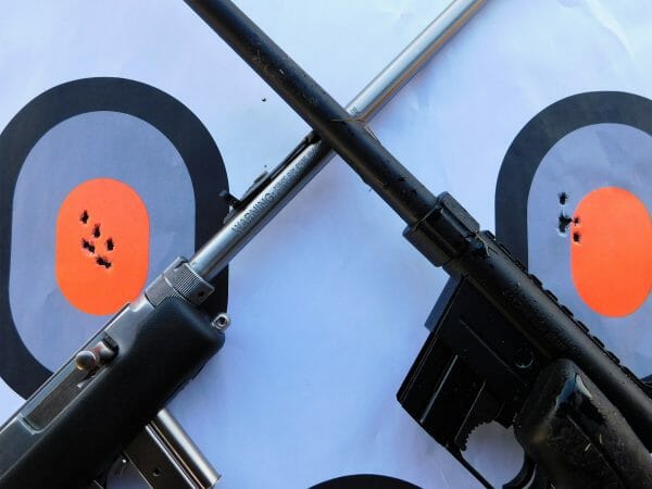 A pair of seven-shot groups posted at twenty-five yards using CCI Blaser 40 grain round-nosed lead ammunition. Both are good, but it is clear the Henry has an edge.