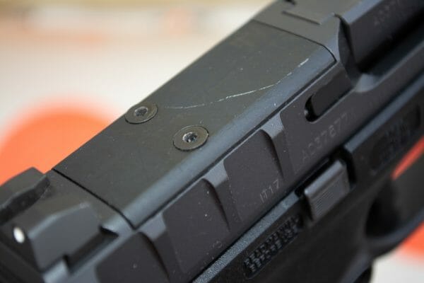 The pistol ships with this cover plate installed so you can use it without an optic too. 